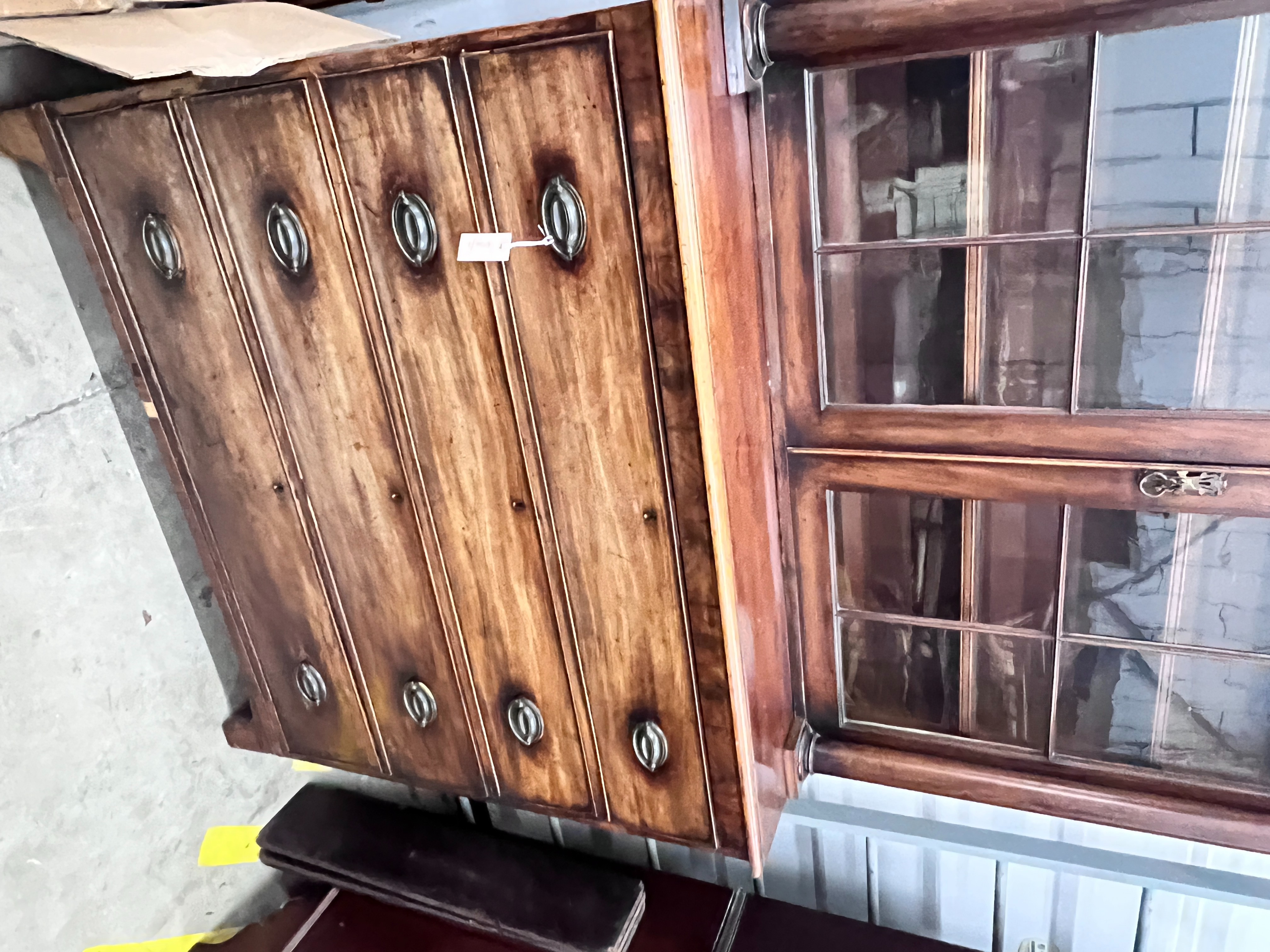 A George IV mahogany secretaire bookcase (top associated), width 125cm, depth 56cm, height 232cm